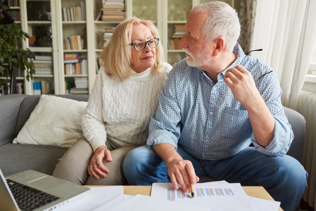 retired,senior,couple,planning,retirement,and,retirement,through,investment,and