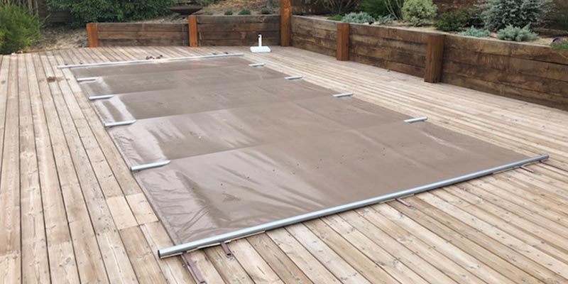 bâche à barres piscine